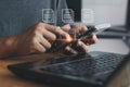 Man using smartphone to manage files, Document Management System DMS, online documentation database, process automation Royalty Free Stock Photo
