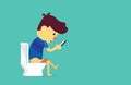 Man using smartphone in toilet.