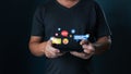 man using smartphone and touch icon social media for online marketing, work from anywhere. technology internet networking, playing Royalty Free Stock Photo