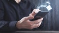 Man using smartphone. Trash can and files. Delete files Royalty Free Stock Photo