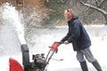 Man Using A Snow Blower Royalty Free Stock Photo