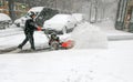 Man using snow blower Royalty Free Stock Photo