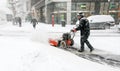 Man using snow blower Royalty Free Stock Photo