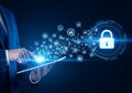 Man using tablet with digital network and padlock icon Royalty Free Stock Photo