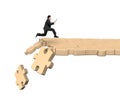 Man using tablet running on breaking puzzle path Royalty Free Stock Photo