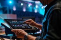 man using a tablet to control av equipment in a hall