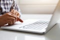 Man using touchpad on notebook with his finger Royalty Free Stock Photo