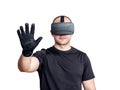 Man using virtual reality headset and touching a virtual interface Royalty Free Stock Photo