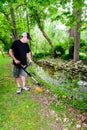 Man Using Weed Trimmer Royalty Free Stock Photo