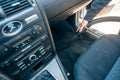 Man vacuuming, hoovering a car interior by vacuum cleaner, cleaning concept Royalty Free Stock Photo