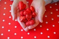 Man with Valentine hearts on polka dot background