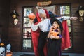 man in vampire costume scaring daughter Royalty Free Stock Photo