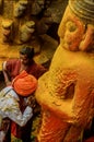 Man verdhiping at stone statyu at khandoba temple, jejuri, pune, Maharashtra, India