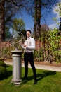 Man in Victorian clothing, shaft and sundial in th