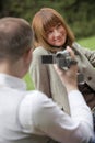 Man with video camera filming