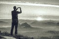 Man on view place on mountain in Saechsische Schweiz