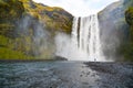 Man view Skogafoss Waterfall in Iceland Royalty Free Stock Photo