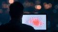 Man viewing data visualization on laptop Royalty Free Stock Photo