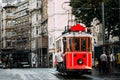 Man in a vintage tram on the Taksim Istiklal street in Istanbul. Man on public transport. Old Turkish tram on Istiklal street,