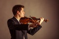 Man violinist playing violin. Classical music art Royalty Free Stock Photo