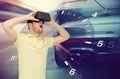 Man in virtual reality headset and car racing game Royalty Free Stock Photo