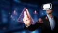 Man in Virtual Reality Headset Engaging with Warning Alerts and Notifications in a Futuristic Digital Environment for Royalty Free Stock Photo