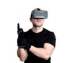 Man with virtual reality headset playing video games