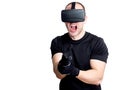 Man with virtual reality headset playing video games