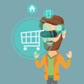 Man in virtual reality headset shopping online. Royalty Free Stock Photo