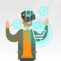 Man in virtual reality headset shopping online. Royalty Free Stock Photo