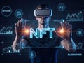 Man in virtual reality interacting with holographic nft interface Royalty Free Stock Photo