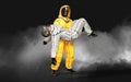 Man in virus protective biohazard suit,  wearing mask to stop corona virus or covid 19 Royalty Free Stock Photo