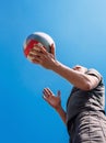 Man on volleyball service with blue sky Royalty Free Stock Photo