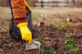 Man volunteer cleaning up the trash in park. Picking up rubbish outdoors. Ecology and environment concept Royalty Free Stock Photo