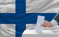 Man voting on elections in finland