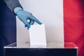 Man voting on elections in france during pandemic. Royalty Free Stock Photo