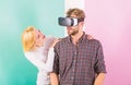 Man VR glasses enjoy video game. Girl happy he like her gift. Gift ideas for men. Make him happy gift him virtual Royalty Free Stock Photo