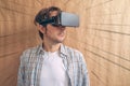 Man with VR goggles exploring virtual reality econtent Royalty Free Stock Photo