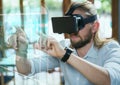 Man in VR headset touching interface Royalty Free Stock Photo