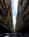Hong Kong - January 12 2020 : Narrow alley inside Man Wah Sun Chuen, Low Angle View Royalty Free Stock Photo
