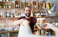 Man or waiter serving customer at coffee shop Royalty Free Stock Photo