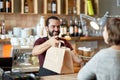 Man or waiter serving customer at coffee shop Royalty Free Stock Photo