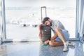 Man waiting for his flight in the international airport Royalty Free Stock Photo