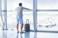 Man waiting for his flight in the international airport Royalty Free Stock Photo