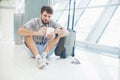 Man waiting for his flight in the international airport Royalty Free Stock Photo