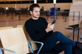 Man waiting for his flight Royalty Free Stock Photo