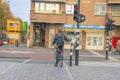 Man Waiting At The Red Light At Amsterdam The Netherlands