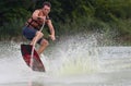Man wakeboarder on pond in park Royalty Free Stock Photo