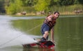 Man wakeboarder on pond in park Royalty Free Stock Photo