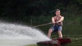 Man wakeboarder on pond in park Royalty Free Stock Photo